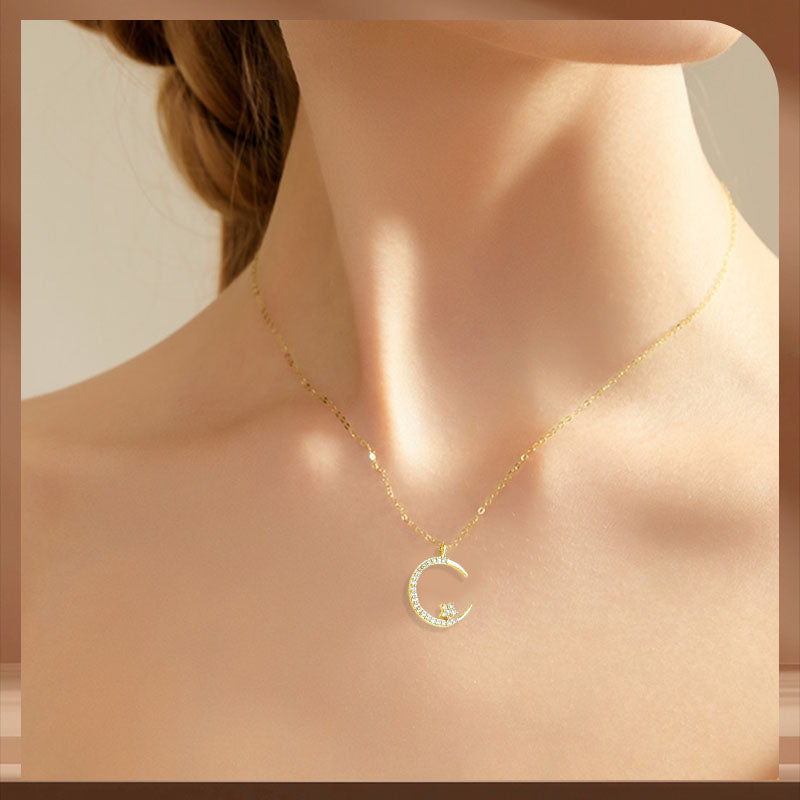Collar brillante con luna y estrellas