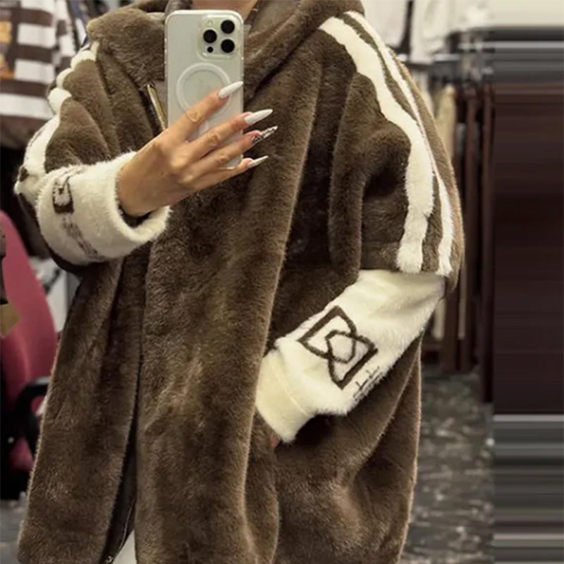 Abrigo informal de mujer con capucha y cremallera